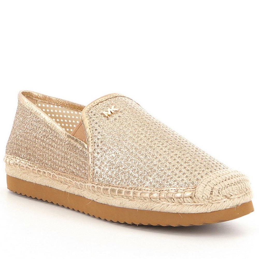 Michael Kors gold espadrilles.